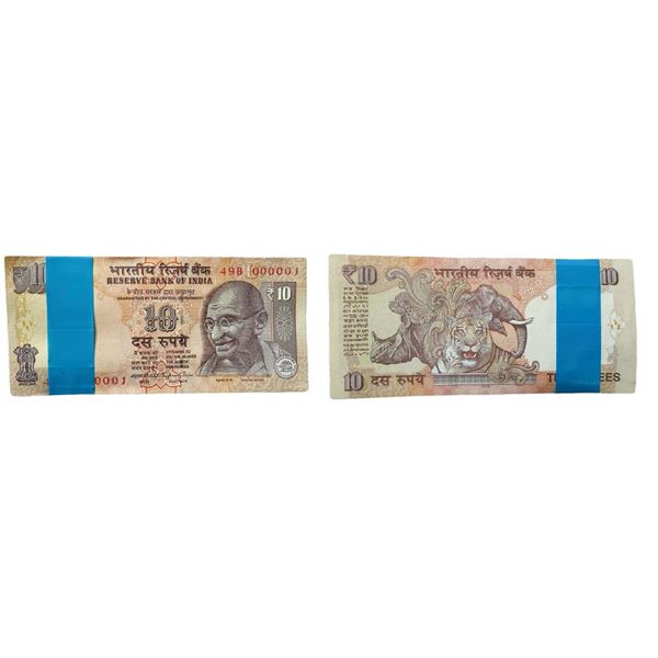 Rupees 10 bundle 2015, signed Raghuram rajan, the bundle starts with a fancy number 000001 and ends 