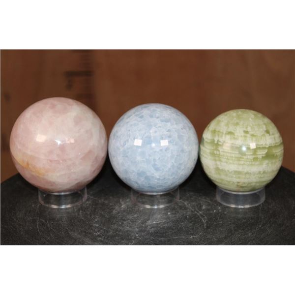 3 Mineral Spheres. (1) ROSE QUARTZ, (1) BLUE CELESTITE, and (1) GREEN BANDED ONYX
