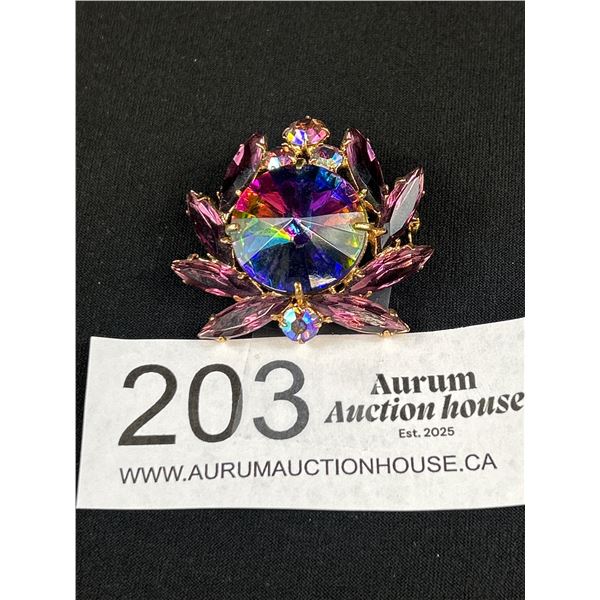 Vintage Rhinestone Flower Brooch w/ Rivoli Center stone surrounded by purple rhinestones