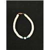 Image 5 : Vintage Puka Shell Necklace + Bracelet