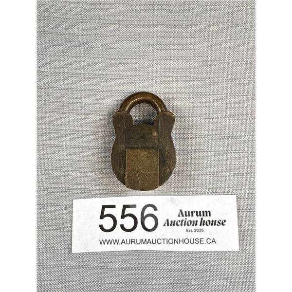 A Heavy Early 1900s Brass Padlock w/ Slider