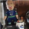 Image 7 : Lot of Assorted Collectibles and Moto Helmet: Cups, Charms, Canucks Doll, Pucks