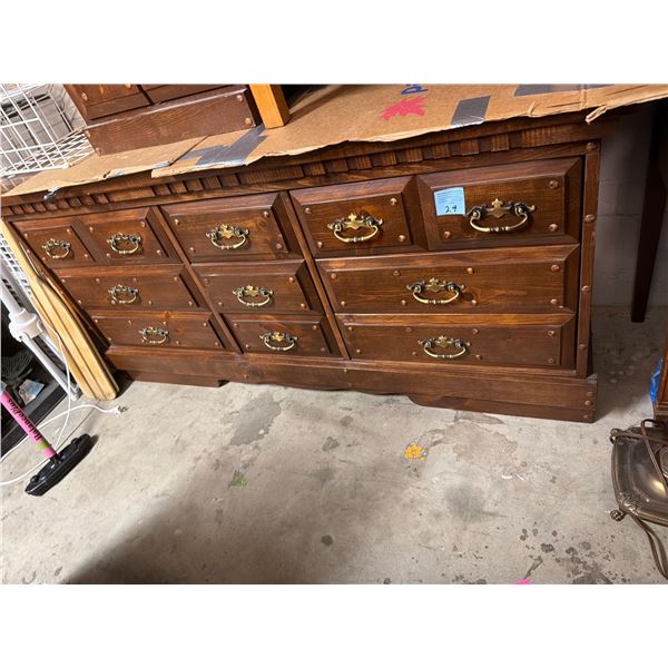 Solid wood dresser, measures, 62 1/2" x 19" x 31" tall