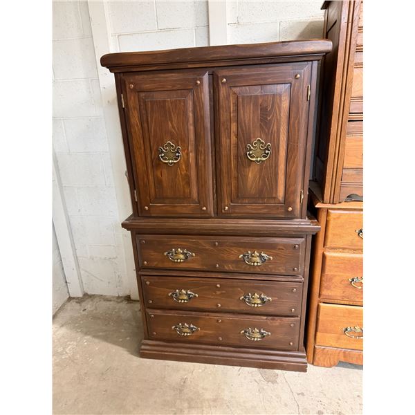 Dresser measures 32" x 18" x 57" tall