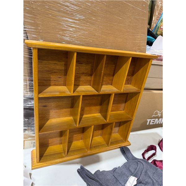 Knickknack shelf measures 19 and three-quarter inches 19 inches