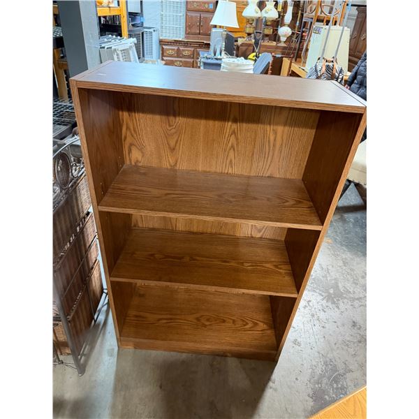 Bookshelf measures 27 and three-quarter inches by 11 and three-quarter inches by 43 1/2 inches tall