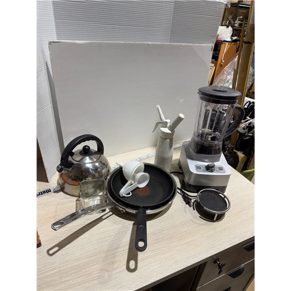 Assorted kitchen items, blender, kettle, etc.