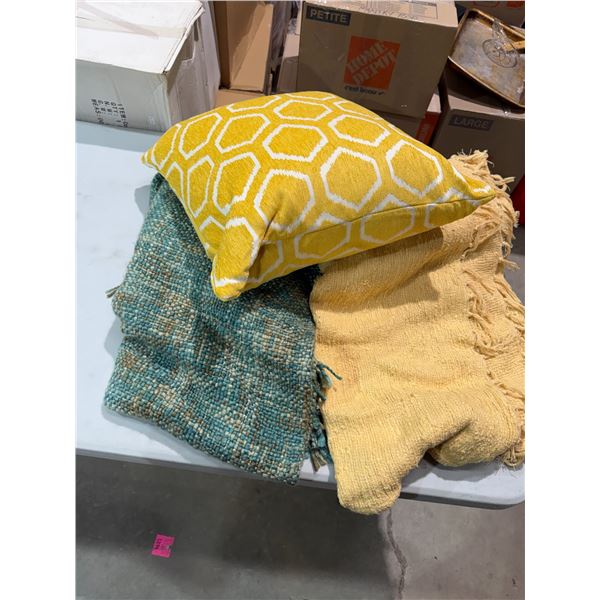 Throw blankets and cushion