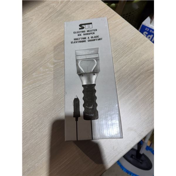 Electric heated ice scraper