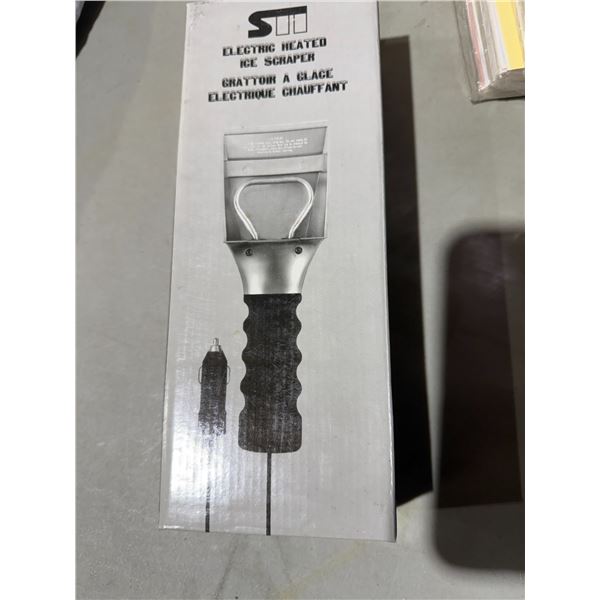 Electric heated ice scraper