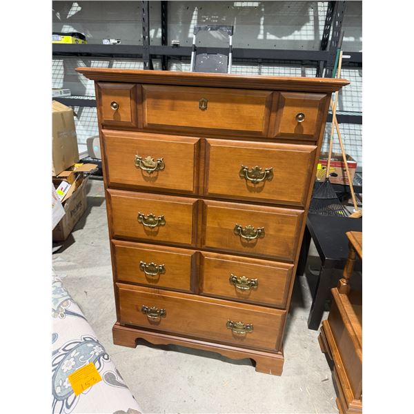 Vilas  maple dresser measures 33 and three-quarter inches by 17 1/2" x 48" tall
