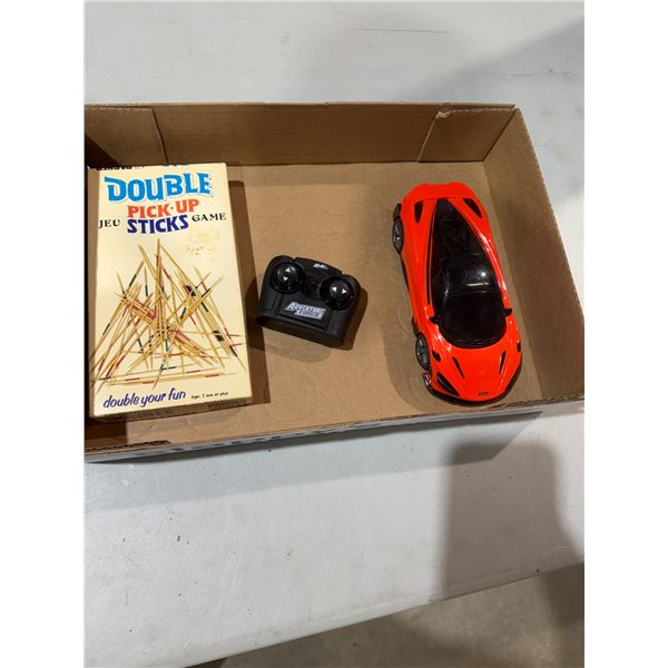 Remote control vehicle and pick up sticks