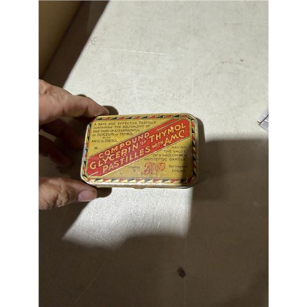 Vintage tin with game tokens