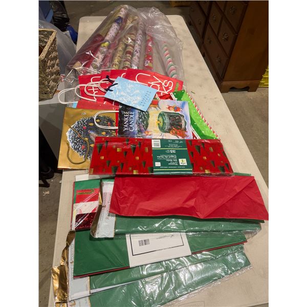 Christmas wrapping paper, tissue paper, and bags