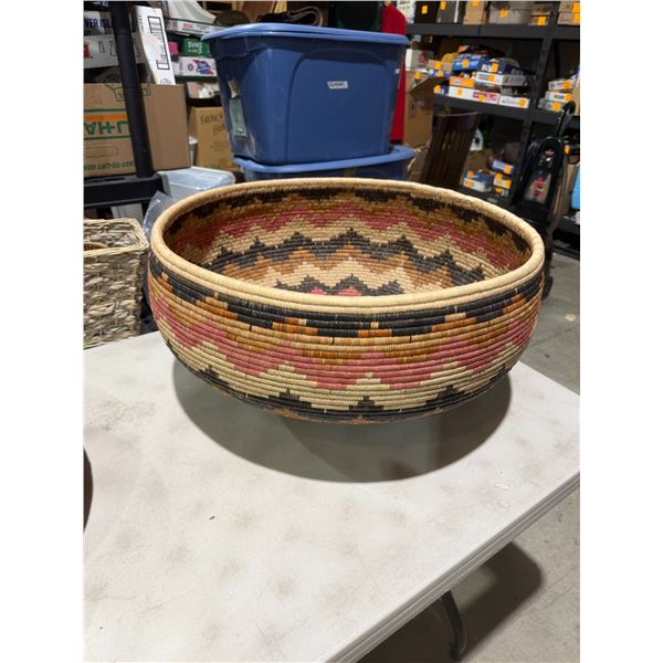handwoven African coiled basket bowl, likely of Zulu or Hausa origin measures 24 1/2 inches round an