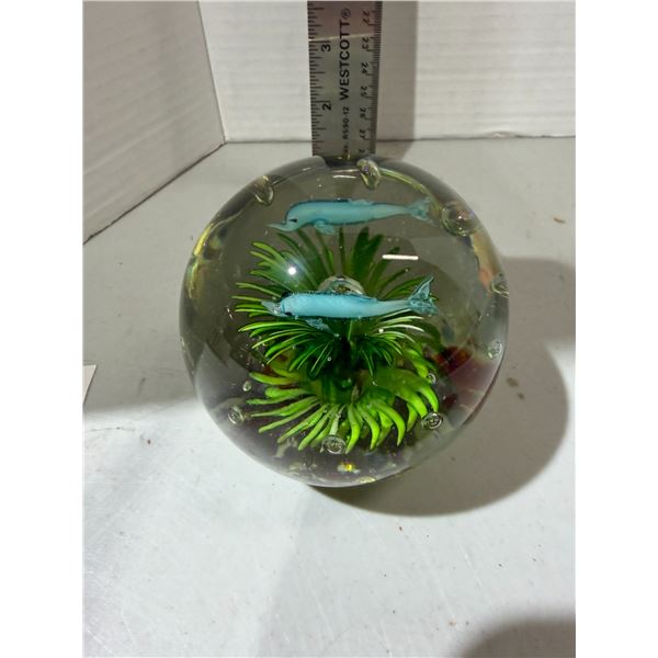 glass aquarium paperweight featuring blue dolphins and green aquatic plants
