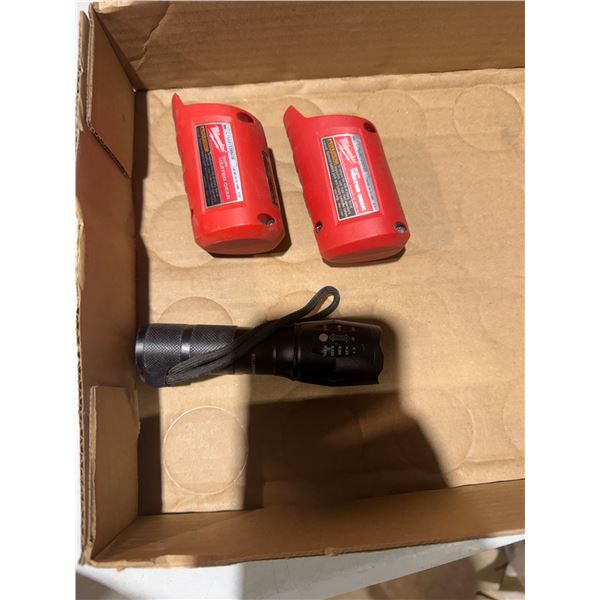 Milwaukee items and a flashlight