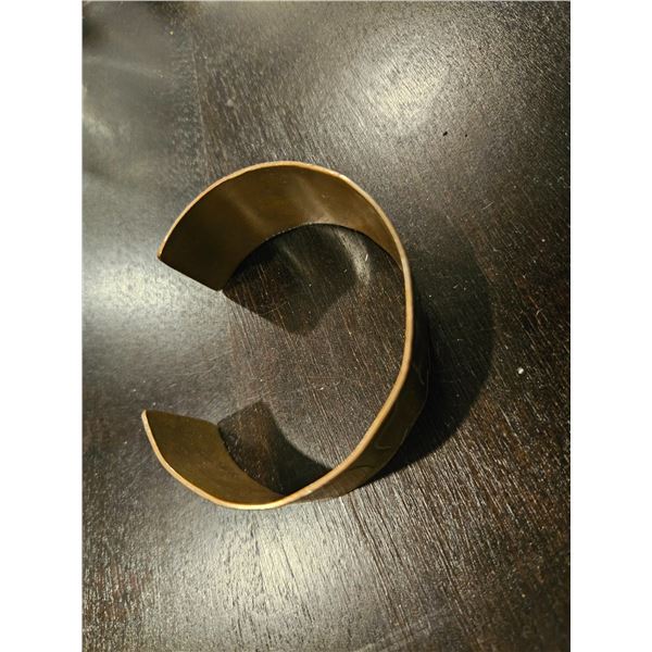 Bracelet spells "Catherine"