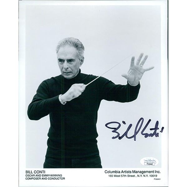 Composer Bill Conti signed photo. JSA Authenticated