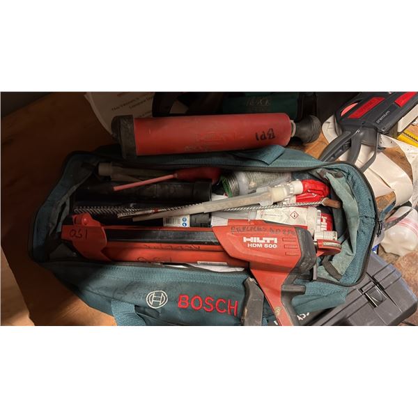 BAG WITH HILTI TWO PART EPOXY GUN AND OTHER COMPONENTS. HDM500