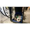 Image 5 : MILERMATIC 211 AUTOSET WITH MVP WIRE FEED WELDER ON WHEELED CART WITH GAUGES, HELMET. TANK