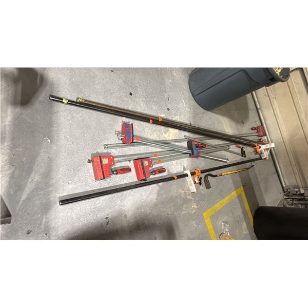 GROUP OF LONG BAR CLAMPS. 4'-8' LONG. 8 PIECES PLUS HEAVY DUTY CROW BAR WITH GARBAGE CAN