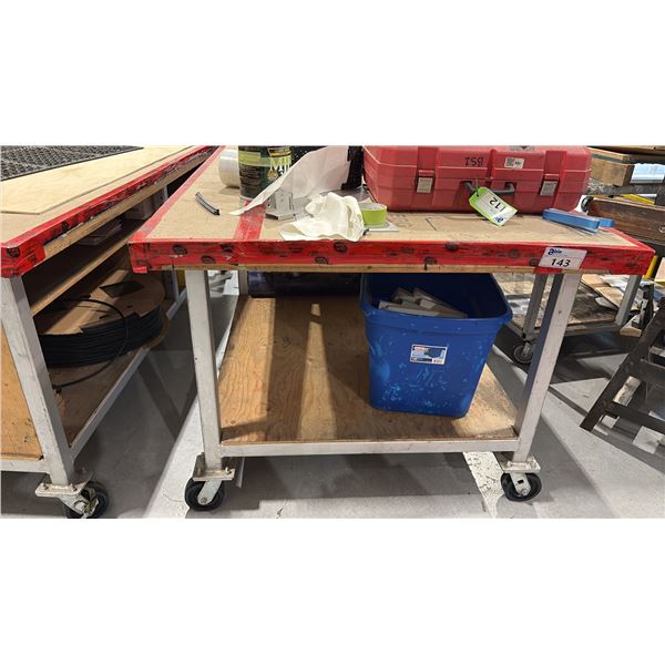 8X4' ROLLING WORK TABLE. 2" METAL TUBE WITH 5" HEAVY DUTY WHEELS-NO CONTENTS