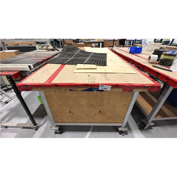 8X4' ROLLING WORK TABLE. 2" METAL TUBE WITH 5" HEAVY DUTY WHEELS-NO CONTENTS