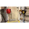 Image 1 : REELWORKS 50' AIR HOSE REEL AND 40' EXTENSION CORD REEL. BRING TOOLS TO REMOVE FROM WALL