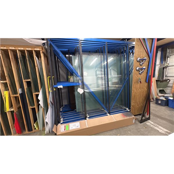 GLASS STORAGE RACK. 10' LONG HOLDS SHEETS UP TO 10' X 7'. HEAVY DUTY CASTORS. HAS 12 GLIDE OUT