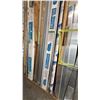 Image 6 : LARGE GROUP OF ALUMINUM EXTRUSIONS LEANING ON WALL IN BAY 1. INC WALL DIVIDING HARDWARE WHICH