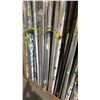 Image 8 : LARGE GROUP OF ALUMINUM EXTRUSIONS LEANING ON WALL IN BAY 1. INC WALL DIVIDING HARDWARE WHICH