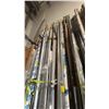 Image 9 : LARGE GROUP OF ALUMINUM EXTRUSIONS LEANING ON WALL IN BAY 1. INC WALL DIVIDING HARDWARE WHICH