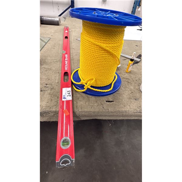PART ROLL OF 1/2" YELLOW NYLON ROPE AND 6' LEVEL