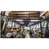 Image 1 : INDUSTRIAL REMOVABLE MEZZANINE. MEASURES 13'10"X18'6"X10'H. WITH LIGHTING AND 2X10" AND