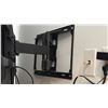 Image 5 : 75" LG SMART TV MODEL 75UN7070PUC WITH WALL MOUNT. BUYER TO BRING TOOLS AND HELP FOR REMOVAL.