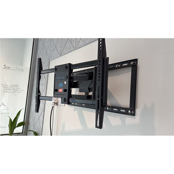 LARGE TV WALL MOUNT. BUYER TO BRING TOOLS FOR REMOVAL