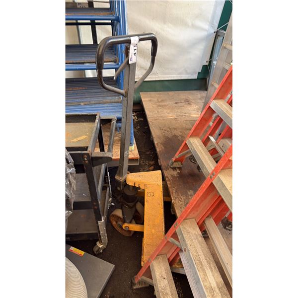 YELLOW PALLET DOLLY. NOT TESTED.