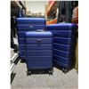 Image 2 : Pack & Fly 3-Piece Luggage Set Navy Blue 20-inch (cabin), 24-inch (medium), and 28-inch (large).