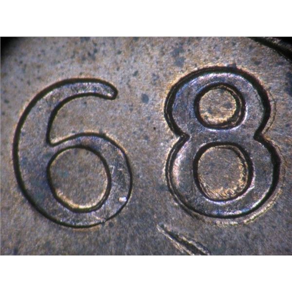 1968 MS60 , Doubled 8 struck through rim fin obverse