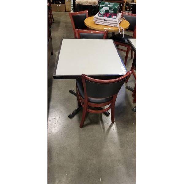 PUB DINING TABLE WITH CAST IRON BASE, AND 2 AS NEW LEATHER SEAT SOLID WOOD DINING CHAIRS, TABLE IS 3