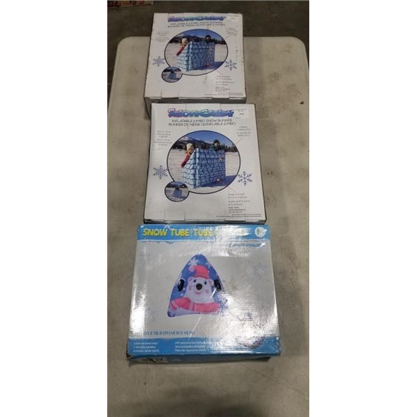 2 INFLATABLE SNOW BUNKERS AND 1 SNOW TUBE