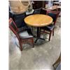 Image 1 : ROUND SOLID WOOD PUB DINING TABLE WITH CAST IRON BASE, 32 INCH DIAMETER, AND 2 AS NEW BLACK LEATHER 