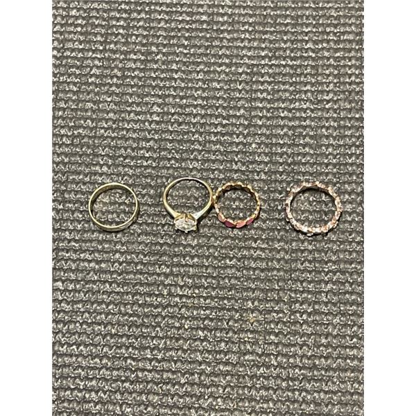 4 GOLD TONE LADIES RINGS