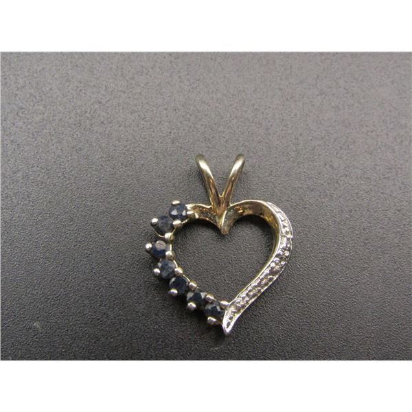 Sterling Silver Heart Shaped Pendant With Black and Clear Stones