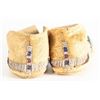 Image 8 : Child’s Moccasins and Breastplate