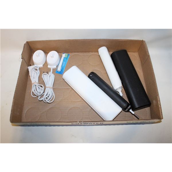 2 ELECTRIC TOOTHBRUSHES WITH CASE AND NEW HEAD