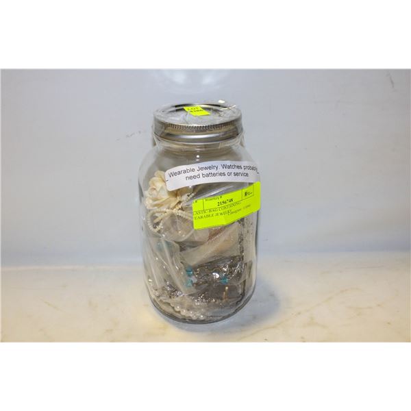 PLASTIC BAG CONTAINING WEARABLE JEWELRY