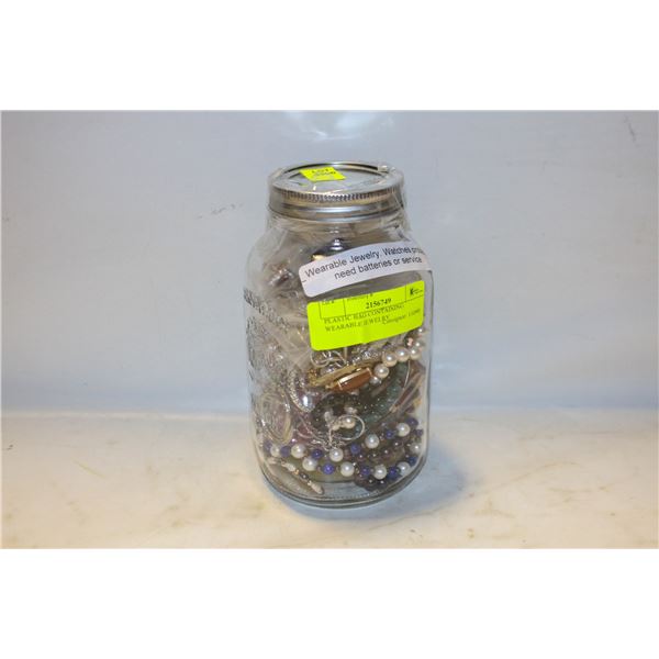 PLASTIC BAG CONTAINING WEARABLE JEWELRY