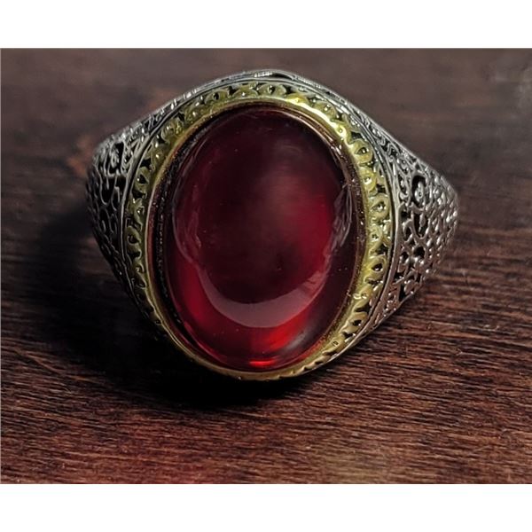 17)  SILVER TONE WITH GOLD TONE BEZEL